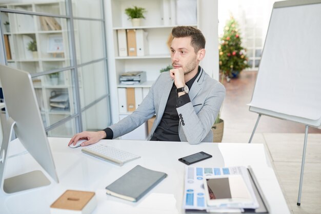 Young Businessman Working in Office