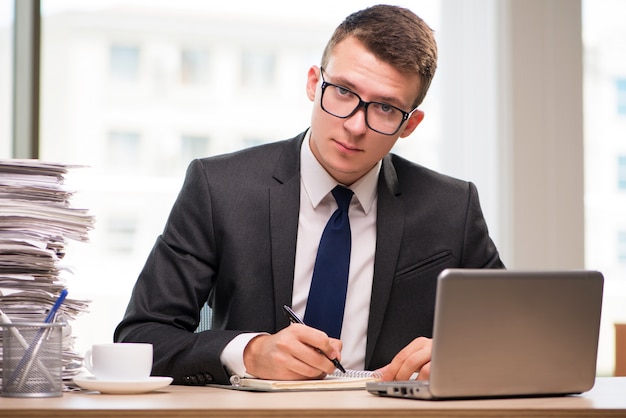 Young businessman working in the office