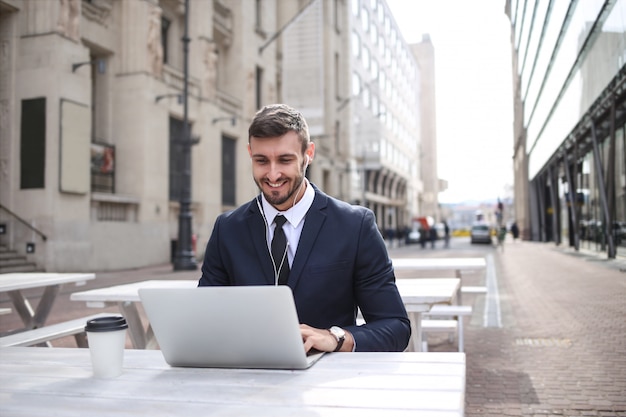 Young businessman working outdoor