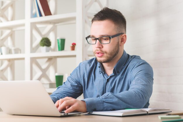 Young businessman working on project