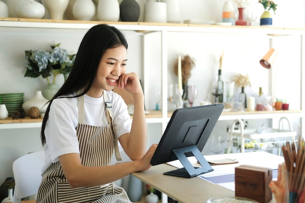 Young businessowner excited feel ecstatic reading great online news on laptop