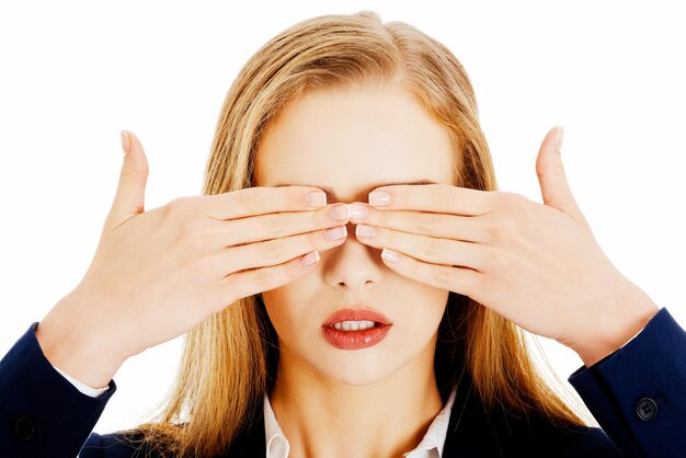 Young businesswoman against white background