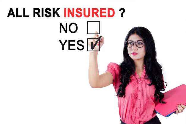 Young businesswoman approving all risk insured