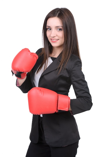 Young businesswoman in boxing concept.