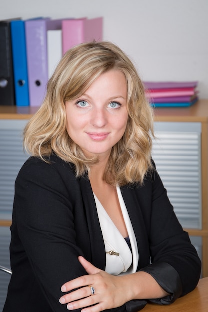 Young businesswoman  at her desk