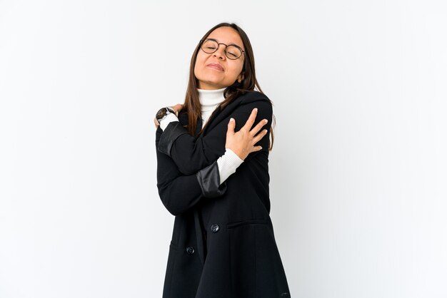 Young businesswoman hugs, smiling carefree and happy