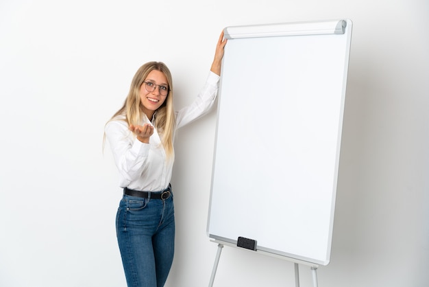 Young businesswoman isolated on white