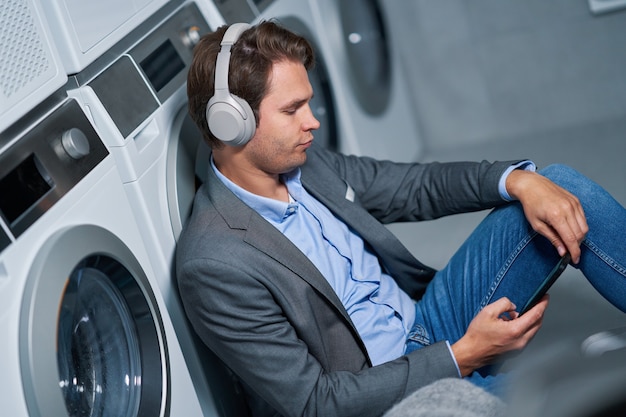 young businesswoman in laundry room