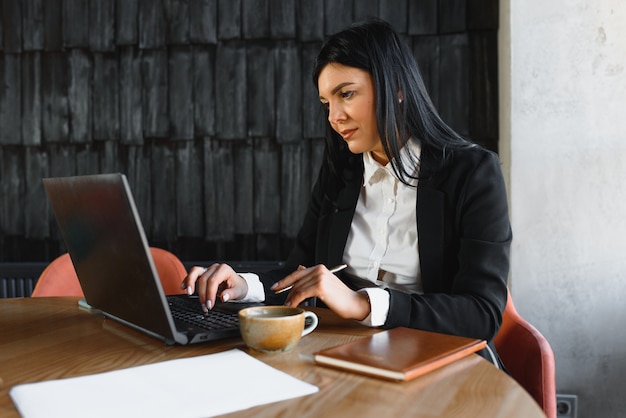 Young businesswoman at the office