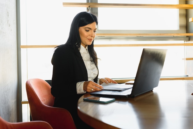 Young businesswoman at the office