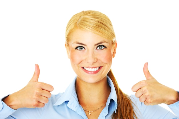 Photo a young businesswoman showing ok sign over white background
