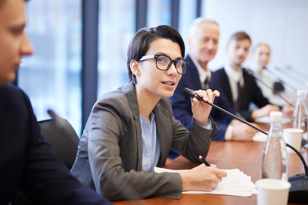 Young Businesswoman Speaking at Conference