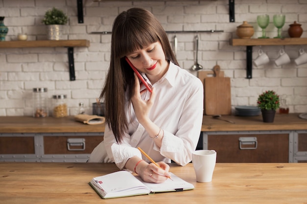 Young businesswoman talking on the phone