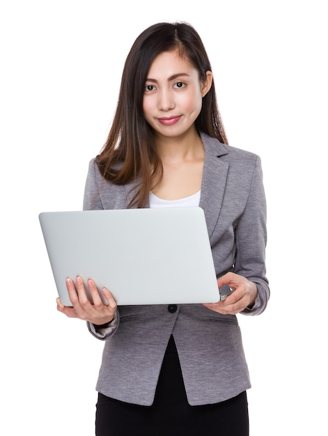 Young businesswoman use of the notebook computer