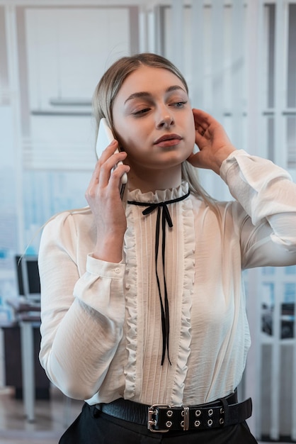 Young businesswoman use smart phone at office Lunch Break