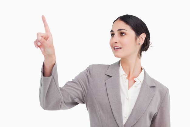 Young businesswoman using touch screen