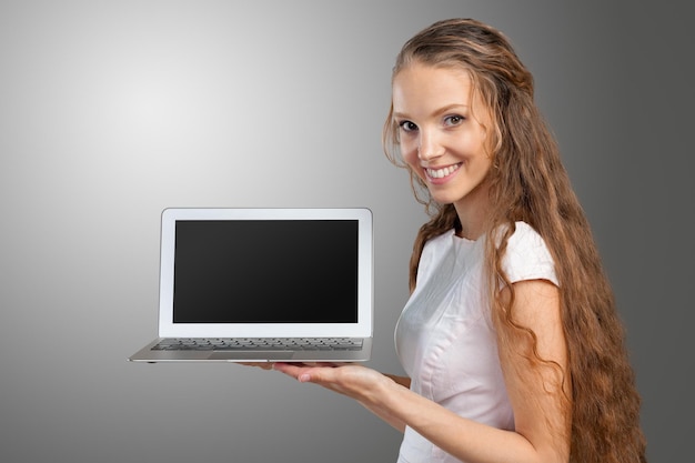 Young businesswoman with laptop