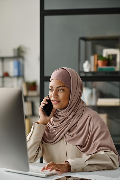 Young businesswoman with smartphone