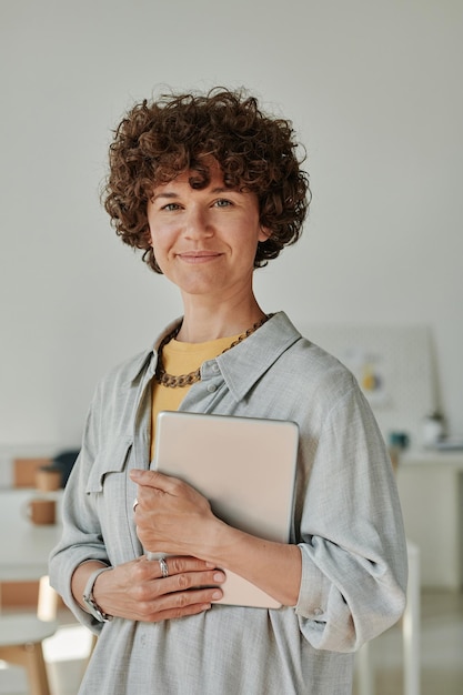 Young businesswoman with tablet pc at office