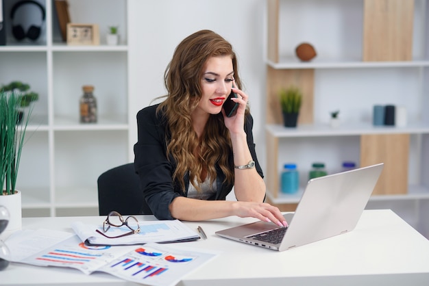 Young businesswoman working at the office