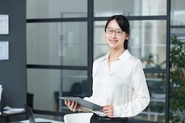 Young businesswoman working in office