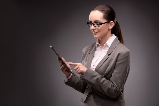 Young businesswoman working with tablet computer