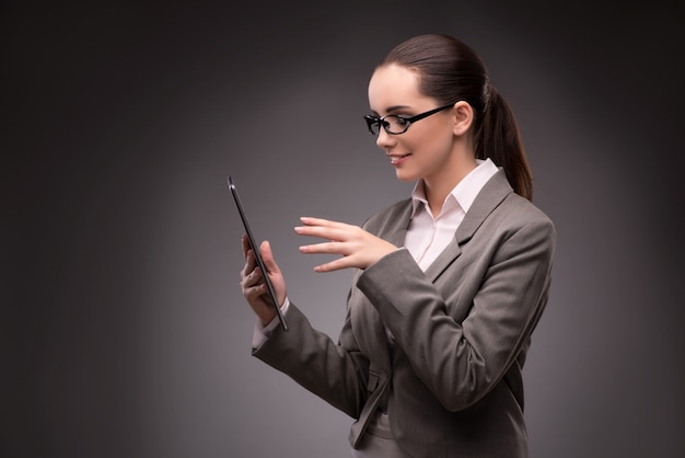 Young businesswoman working with tablet computer