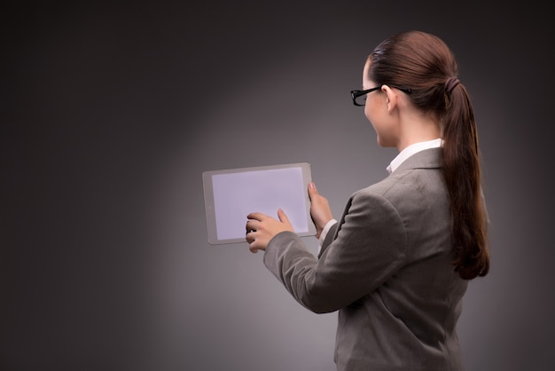 Young businesswoman working with tablet computer