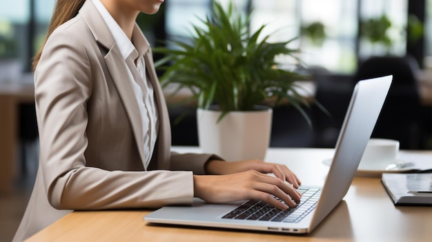 Young businesswoman workinglaptopoffice