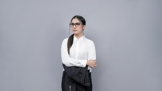 young businesswomen with glasses folding hand wearing white shirt indian pakistani model