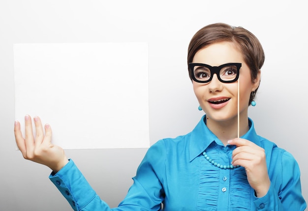 young casual woman happy holding blank sign happy time