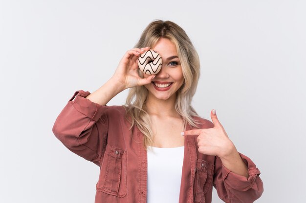 Young caucasian beauty woman over isolated white wall