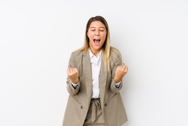 Young caucasian business woman isolated cheering carefree and excited. Victory concept.