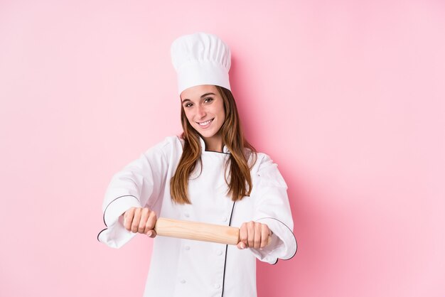 Young caucasian chef woman cooking