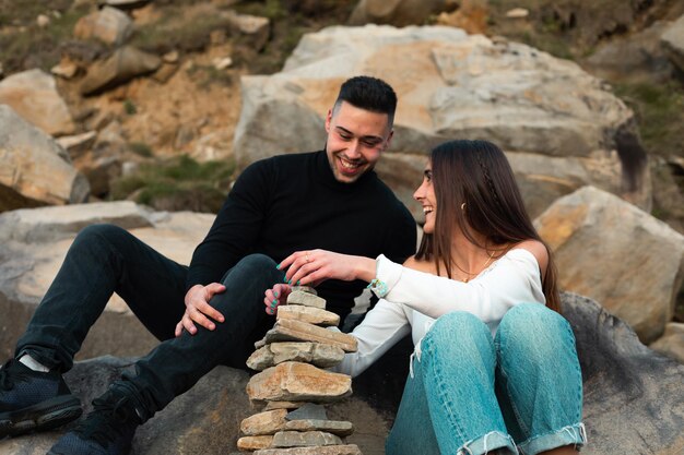 Couple enjoying hillside view, Chas de Egua, Portugal - Stock