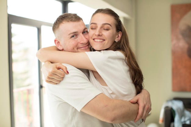 young caucasian couple expressing a concept