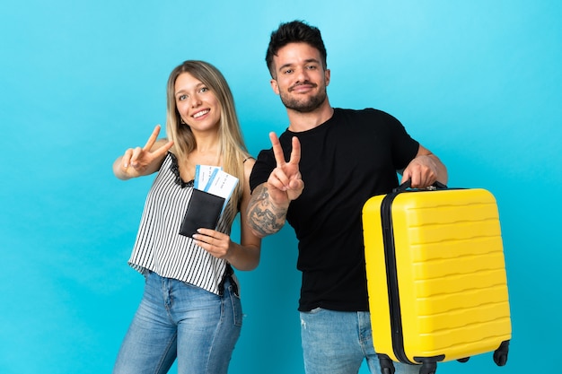 Young caucasian couple going to travel