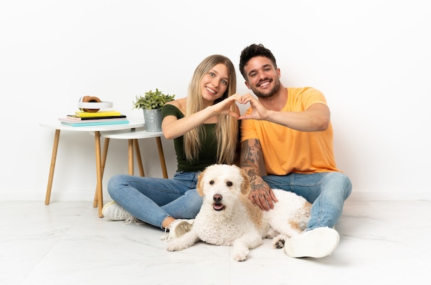 Young caucasian couple with dog