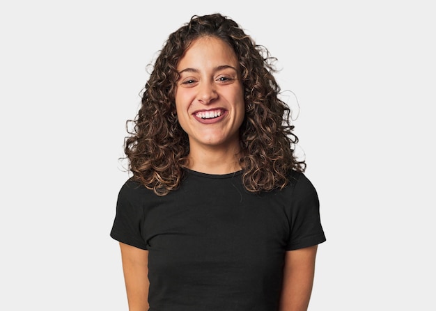 A young caucasian cute curly hair woman smiling