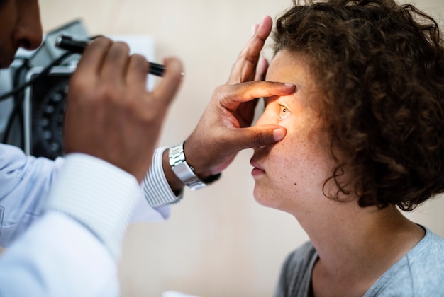 Young Caucasian girl getting an eye examination