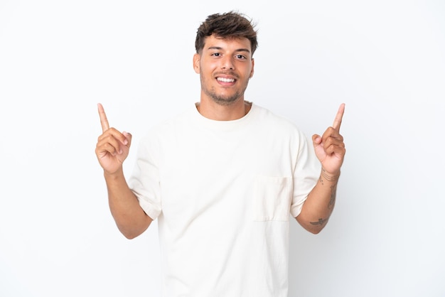 Young caucasian handsome man isolated on white background pointing up a great idea