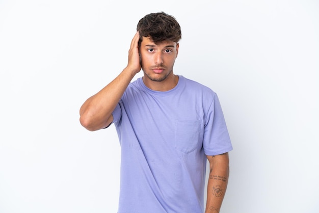 Young caucasian handsome man isolated on white background with an expression of frustration and not understanding