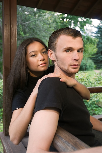 Young caucasian heterosexual couple spending time together at the park