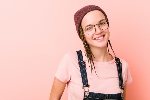 Young caucasian hipster woman happy, smiling and cheerful.