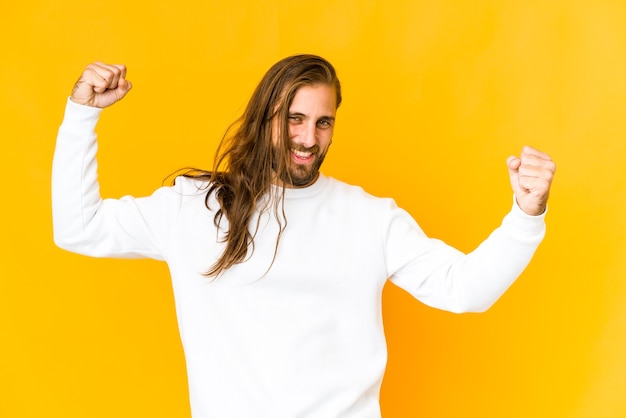 Young caucasian long hair man expressing emotions isolated