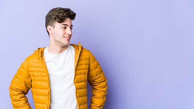 Young caucasian man confident keeping hands on hips