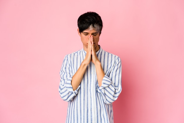 Young caucasian man expressing emotions isolated