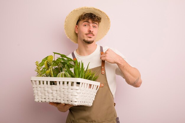 Young caucasian man farmer concept