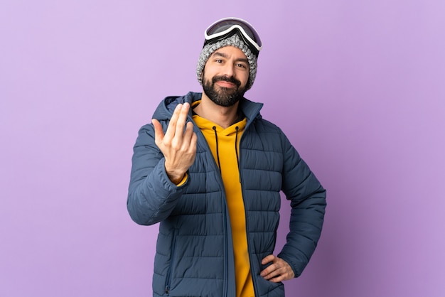 Young caucasian man over isolated wall