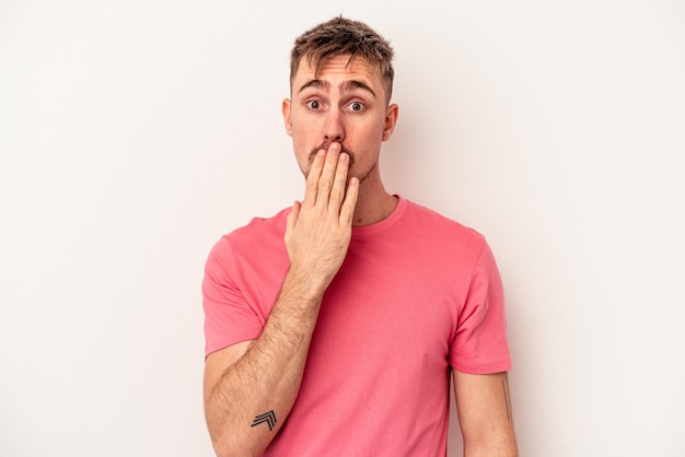 Young caucasian man isolated on white background whining and crying disconsolately.